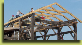 Click to view larger photo of building the roof