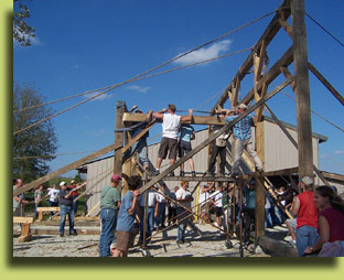 Click to view larger photo the group lifting the timber-framed wall